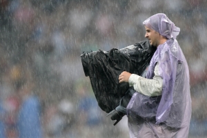 fotoreportér v dešti